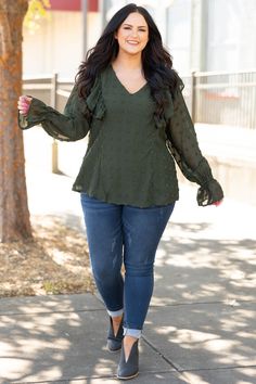 Get this top for a new fresh look! This cutie has a stunning olive color to match everything with and a raised dot pattern that is super on trend! The bubble sleeves are so stylish and the sheer look on them is so fun! We love the ruffles on the shoulders that give this a hint of sweetness! Style this top with skinny jeans and booties for a look that will turn heads! 100% Polyester Babydoll Shirt, The Bubble, Feel Pretty, Olive Color, Fresh Look, Model Fits, Dots Pattern, Office Outfits, Look On