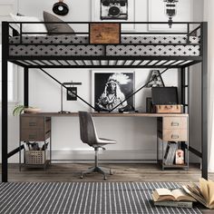 a loft bed with a desk underneath it and an open book on the floor next to it