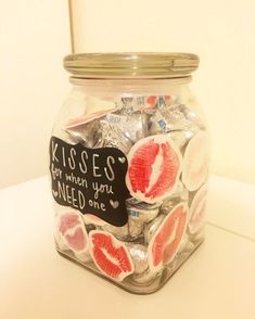 a glass jar filled with candy and kisses for when you need one written on it