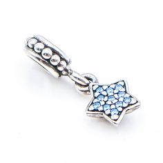 Authentic PANDORA Blue Pave Star Sterling Silver Dangle Dangle Charm With Blue Zirconia 791024CZB - Retired. This beautiful sterling silver star dangle charm will twinkle on your bracelet with its blue pavé zirconias. This item is retired from production and may be difficult to find. Charm is pre-owned and in great condition. Buy with confidence that all my Pandora items are 100% authentic Pandora. All precious metals are tested and are guaranteed with the Thermo Scientific Niton DXL Xray Scanne Blue Star Charm Jewelry, Pandora Blue, Dangle Charms, Star Charms, Silver Stars, Jewelry Pouch, Pandora Charms, Twinkle Twinkle, Precious Metals