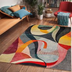 a colorful rug in the middle of a living room