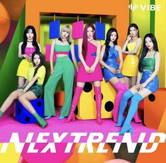 the girls are posing in colorful outfits