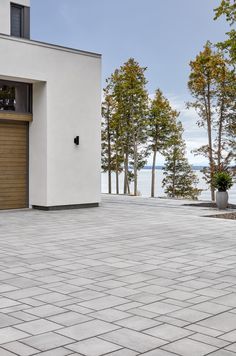 a white house with an open garage door