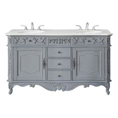 a double sink vanity with two sinks and an ornate design on the top, in grey