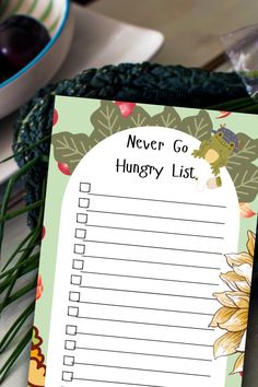 a notepad with the words never go hungry list on it