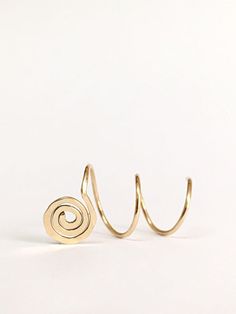 Gorgeous spiral threader earrings. Minimalist, comfortable, perfect for everyday use. The earrings are sold as single or as a pair of your choice and in 14K gold filled or sterling silver 925, see variations in drop-down menu. Measures: Each ear hoop is 9mm diameter. For different size, please contact us. How to use: 1. Adjust spiral width to much your piercings. 2. Insert the earring to first hole and then twist throw each hole. Made to order. Will arrive in a pretty gift box ready to give or k Adjustable Spiral Hoop Earrings, Metal Spiral Wrap Earrings, Metal Spiral Wrap Single Earring, Spiral Metal Wrap Earrings, Spiral Ear Cuff, Spiral Cartilage Earrings As Gift, Hoop Earrings Piercing, Triple Piercing, Gold Threader Earrings