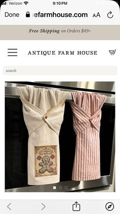 an appliance with two towels hanging from it's handles and the words antique farm house