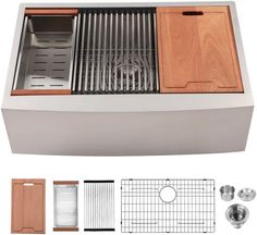 a kitchen sink with wooden cabinets and stainless steel strainers on the bottom, in front of