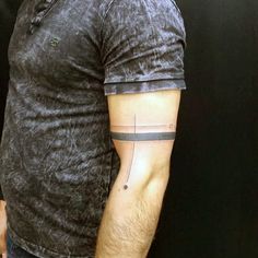 a man with a tattoo on his arm