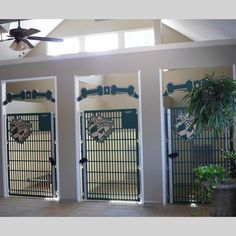 three doors are open in the middle of a room with plants and potted plants