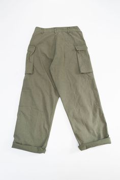 We've been waiting on these all Spring. After acquiring the 6-pocket and easy cargo, we kept saying to ourselves, "We need a wider fit too." This is about as wide as it gets for an orSlow cargo. They're a repro of an Army cargo pant using the same fabric and buttons you loved so much from the M-43 HBT Jacket. It's a medium-weight herringbone in olive drab or "army green." The buttons are incredible black-coated starred metal with a bit of the paint already chipped off for you. These pants are ro Military Style Full-length Parachute Pants With Pockets, Military Full-length Parachute Pants With Pockets, Military-style Relaxed Fit Bottoms With Pockets, Military Style Relaxed Fit Bottoms With Pockets, Military Style Bottoms With Pockets And Relaxed Fit, Military Parachute Pants With Side Pockets, Military Straight Leg Pants With Pockets, Military Style Straight Leg Pants With Pockets, Military Style Parachute Pants With Side Pockets