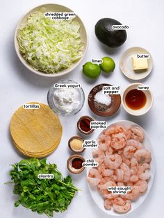 ingredients to make shrimp salad laid out on a table