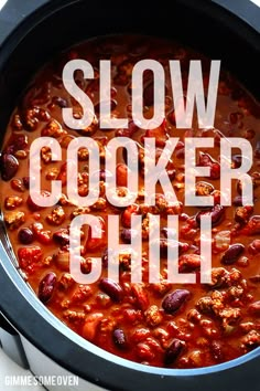 slow cooker chili in a crock pot with the words slow cooker chili above it