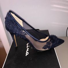 Beautiful Nina Navy Blue Satin And Mesh Pump With Flower And Bead Detail. Brand New Never Worn With Original Box. Leather Sole. Heel Measures 4 Inches. Pet And Smoke Free Home. Embellished Lace Heels For Party, Lace Embellished Heels For Party, Chic Blue Heels For Prom, Blue Embellished Heels For Special Events, Elegant Blue Heels For Night Out, Blue Embellished Heels With Pointed Toe, Elegant Blue Synthetic Heels, Black Dress High Heels, Navy Blue Wedding Shoes