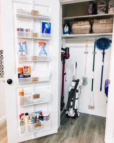 the closet is full of cleaning supplies and other household care products, including brooms