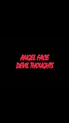 the words angel face devil thoughts are lit up in red on a dark black background