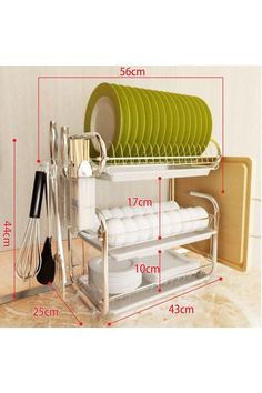 the dish rack is full of dishes and utensils, with measurements for each plate