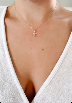 "Little Cross Necklace, tiny cross necklace, Dainty Minimalist Cross, 18K Gold Filled Chain, Gold Layering Necklace, cross necklace ♥This necklace features a delicate 14k gold filled chain, with a hint of shimmer.  Adorned with a gold & cz cross pendant.  Finished with a traditional gold filled spring clasp.   ♥The Cross is a dainty 12mm x 8mm  ♥LENGTH - The length shown is 16\". Please choose your desired chain length when checking out. ♥FINISH - Available in gold & silver. Please choose your d Small Gold Cross Necklace, Dainty Gold Cross Necklace, Tiny Cross Necklace, Dainty Cross Necklace, Tiny Cross, Mini Cross, Gold Cross Necklace, Jewellery Ideas, Small Crosses