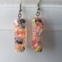 This is a beautiful pair of confetti earrings, made with resin. Very cute Shipping is registered I can combine shipping for multiple items Party Earrings In Multicolor Glass, Handmade Multicolor Resin Earrings, Playful Resin Dangle Earrings, Multicolor Glass Earrings For Party, Party Glass Multicolor Earrings, Artsy Resin Dangle Earrings, Fun Resin Dangle Earrings, Multicolor Glass Drop Earrings, Colorful Funky Earrings For Party