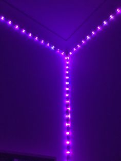 a purple light in the middle of a room