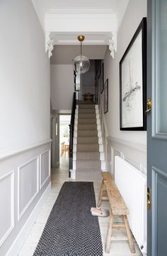 the hallway is clean and ready for us to use as an entrance way in this house