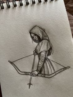 a drawing of a person with a bow and arrow in their hand, on top of a piece of paper