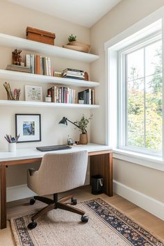 a home office with white shelving and lots of books on the shelves, along with a rug