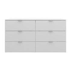 a white dresser with six drawers on it