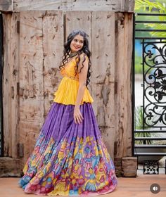 lehenga set  |womens kalamkari lehenga choli |crop top lehenga set |designer kalamkari lehenga dupatta | wedding lehenga choli | hand painted kalamkari lehenga usa Women's lehenga set /kalamkari embroidered lehenga skirt/voggish      lehengas are one of the beautiful and versatile traditional attires of india !! we carry such pieces in budget with great quality that can be styled in multiple ways with different outfits !!       Here is Beautiful pure hand painted Kalamkari lehenga set in lavender color paired with pure silk  hand embroidered yellow peplum long blouse as shown!! skirt has heavy gear and both pieces can be mix and matched with different outfits !! Ready to ship All over the world !, can be customized for kids and teens with measurements!! details:  - blouse has leaf V neck a New Crop Top Lehenga Designs, Pattu Lehenga Blouse Designs Crop Tops, Kalamkari Tops Designs, Kalamkari Outfits, Kalamkari Lehangas Designs, Lehenga Designs Kalamkari, Indian Crop Top Designs, Crop Top Designs For Lehenga, Bohemian Multicolor Gown For Navratri