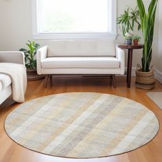 a living room with two couches and a rug