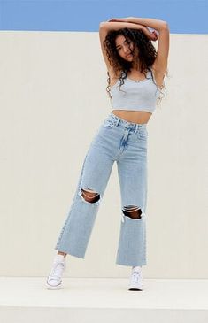 Light Indigo Ripped Cropped Wide Leg Jeans Trendy High Rise Jeans With Zip Fly, Spring Streetwear Cropped Bottoms, Trendy Cropped Denim Blue Bottoms, Spring Cropped Streetwear Bottoms, Light Wash Stretch Cropped Bottoms, Light Wash Ripped Cropped Cotton Jeans, Ripped Light Wash Mid-rise Cropped Jeans, Ripped Stretch Mid-rise Cropped Jeans, Mid-rise Stretch Ripped Cropped Jeans