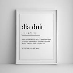 a white framed poster with the words'dia duit'in black and white