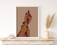 an art print of a woman's hands with hennap and bracelets