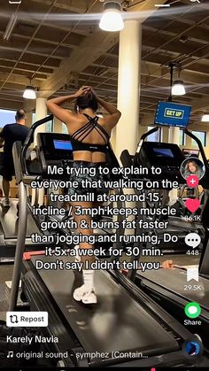 a woman is on an exercise machine in the gym with her back to the camera