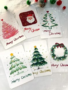 six christmas cards with different designs on them