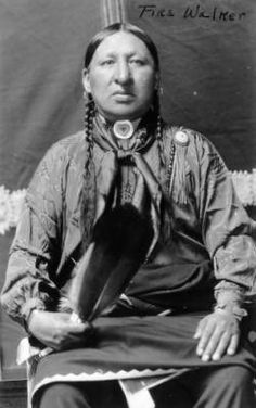 an old black and white photo of a native american woman