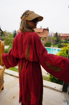 "Beautiful handmade colourful coral red kimono robe, designed with cotton fabric, it flows as you move for a comfortable wear. Beach cover up, a kimono with red coral pattern. This is a lovely, good quality kimono, with traditional breathable kimono sleeves. Belt that ties around the waist. Great to wear around the house, beaches, or to dress up with some jeans & a T-shirt, covering up on the beach with swimsuit. The bird print is really elegant and beautiful. We love kimonos as they are so vers Red Cotton Robe For Spring, Red Kimono For Beach Cover-up, Red Cotton Long Sleeve Robe, Red Long Sleeve Cotton Robe, Long Sleeve Red Cotton Robe, Red Cotton Kimono For Vacation, Red Cotton Robe With Kimono Sleeves, Red Long Sleeve Robe For Summer, Red Long Sleeve Summer Robe