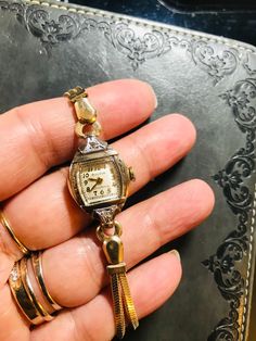 Year 1947(movement marked)  Bulova ~Excellency series A Fine Bulova Vintage Ladies watch (our ref M-29)   2 crown dainty real diamonds  21 rubies, (top precision movements of the time in 1947 & nowadays).  Perfect Dail !  14kGold 1/20 filled bracelet(rare new old stock )  &10K rolled gold case  Art Deco 1947 (movement hallmarked )  Oiled & Serviced - Winds and sets well and timekeeping Good(fit for daily wear like grandma  Signed Movement, dial , crown & case  Cosmetic condition: 98%new (minty )  Case size 20-22mm including winding button. Genuine antique- no rewrite of dail or mixed parts  Rare! Rare! Rare!  * For orders more than £500, ship by EMS/speedpost worldwide with no extra cost !  note : vintage watches / antique watches for more than 50 years ,  we will check before shipment for Vintage Bulova Watches, Wristwatch Vintage, Art Deco Watch, Bulova Watches, Vintage Watches Women, Old Watches, Antique Watches, Old Jewelry, Women Wrist Watch