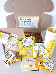 the contents of a baby's first birthday gift box