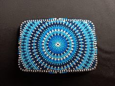 Beautiful Blue sunburst it is 3" × 4.5" and is backed with buckskin Beaded Belt Buckle, Native American Beadwork Patterns, Native Beading, Native American Beadwork, Beading Ideas, Beadwork Patterns, Beaded Belt, Native American Beading, Suspender Belt