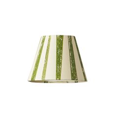 a green and white striped lamp shade on a white background with the light turned off