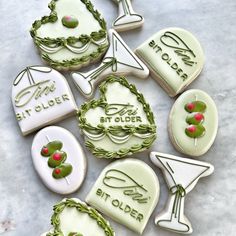 some decorated cookies are sitting on a table