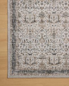 The Anniston Collection is a washable rug with traditional motifs in beautifully saturated and distressed tones. This durable area rug is power-loomed of polyester in China and designed for the busiest rooms of the home—living rooms, bedrooms, kitchens, hallways, and more. It can be washed in a home washing machine without an agitator, depending on the size. Any rug size 5' x 7'6" or smaller, including all runners, can fit into a washing machine that’s 3.4 cubic feet or bigger; 6' x 9' rugs require a washer that’s 4.2 cubic feet or bigger; 7'6" x 9'6" rugs require a washer that’s 4.8 cubic feet or bigger; 9' x 12' rugs must be washed in a commercial washer with at least a 60-lb. capacity. Wash in cold water, delicate cycle, with mild detergent, and no bleach; hang dry or lay flat to dry. Stone Rug, Cottage Exteriors, Holiday Furniture, Cordless Lamps, Kitchen Jars, Nursery Chair, Sideboard Console Table, Traditional Motifs, Portrait Wall