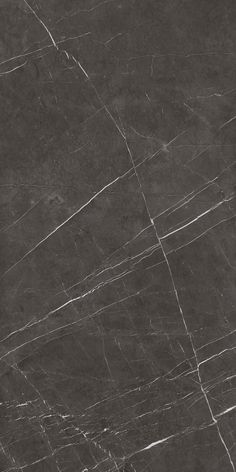 a black marble textured surface with white lines