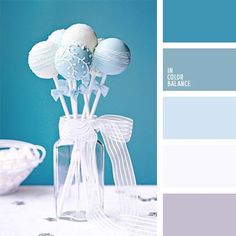 blue and white cake pops in a clear vase