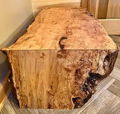 a piece of wood sitting on top of a wooden floor