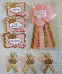 pink and gold baby shower favors with bows