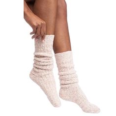 Elevate your lounging experience with these buttery soft, no-slip socks, so you don’t have to sacrifice safety for comfort. Keep your feet toasty while you’re relaxing at home, and enjoy stability on smooth floors thanks to the non-slip grippers on the bottom of each sock. Treat your feet to oversized, and over-comfy, Softies’ marshmallow socks Non-slip grippers on the bottom of each ultra-soft sock One size fits most make these socks the perfect match for every sole Available in multiple colors Slouchy Socks, Cable Knit Socks, Slouch Socks, Bed Socks, Soft Sock, Pop Up Shops, Softies, Heather Black, Knit Socks