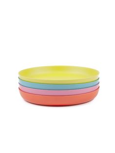 four plates stacked on top of each other in different colors and sizes, with one yellow plate