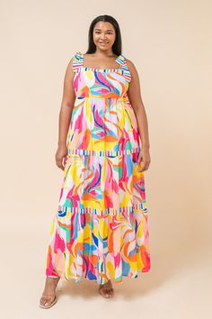 A printed woven maxi dress featuring straight neckline with shoulder ties, and tiered skirt Details Self: 100% Polyester Lining: 100% Polyester Size & Fit - Model is 5`8" And Wearing Size Small - Measurements Taken From Size Small - Approx. Length: 51" Pink Abstract Print Maxi Dress For Summer, Pink Maxi Dress With Abstract Print For Summer, Multicolor Maxi Dress For Beach Party, Chic Floral Print Maxi Sundress, Flowy Tiered Printed Dress, Chic Tiered Maxi Dress With Floral Print, Pink Maxi Dress With Abstract Print, Casual Maxi Dress With Vibrant Print For Parties, Vibrant Print Sundress For Party